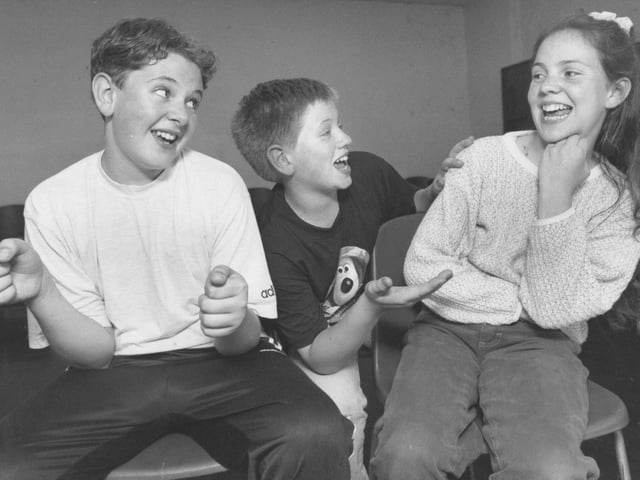 YMCA Theatre School students, from left, Kevin Proctor, Joe Tate and Sarah MacGregor improvise a scene set in a car back in July 1996.
