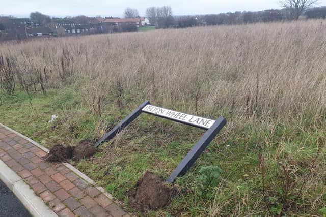 A road sign has been vandalised.