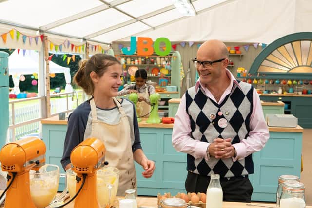 Eliza in the Bake Off tent with host Harry Hill. Picture from Mark Bourdillon/Love Production