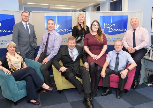 Some of the Lloyd Dowson team with chairman David Dowson (pictured centre).