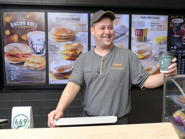 Staff get used to the new look counter.