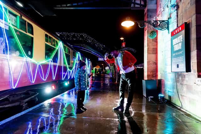 The festive train lights up Pickering Station