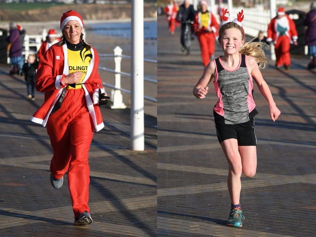 A Santa and a reindeer giving it their all.