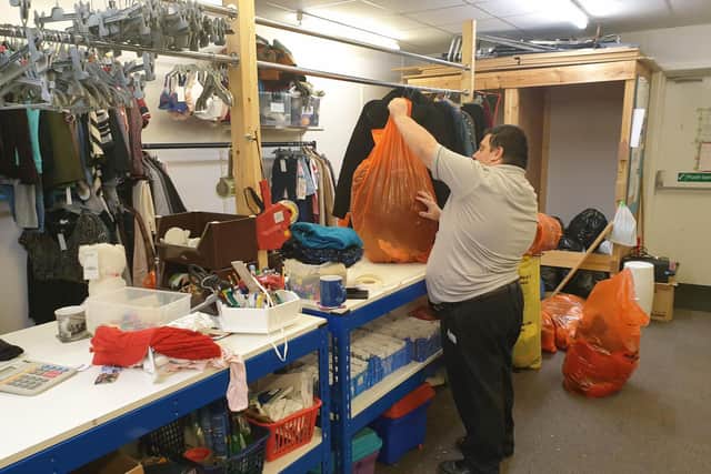 Robert sorts the winter stock.