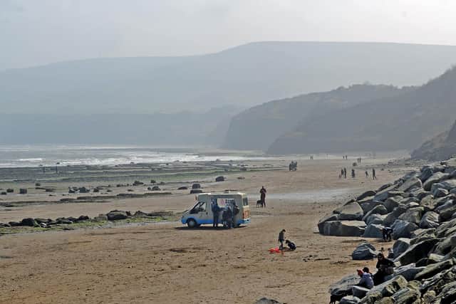 An injured surfer was rescued at Robin Hood's Bay.