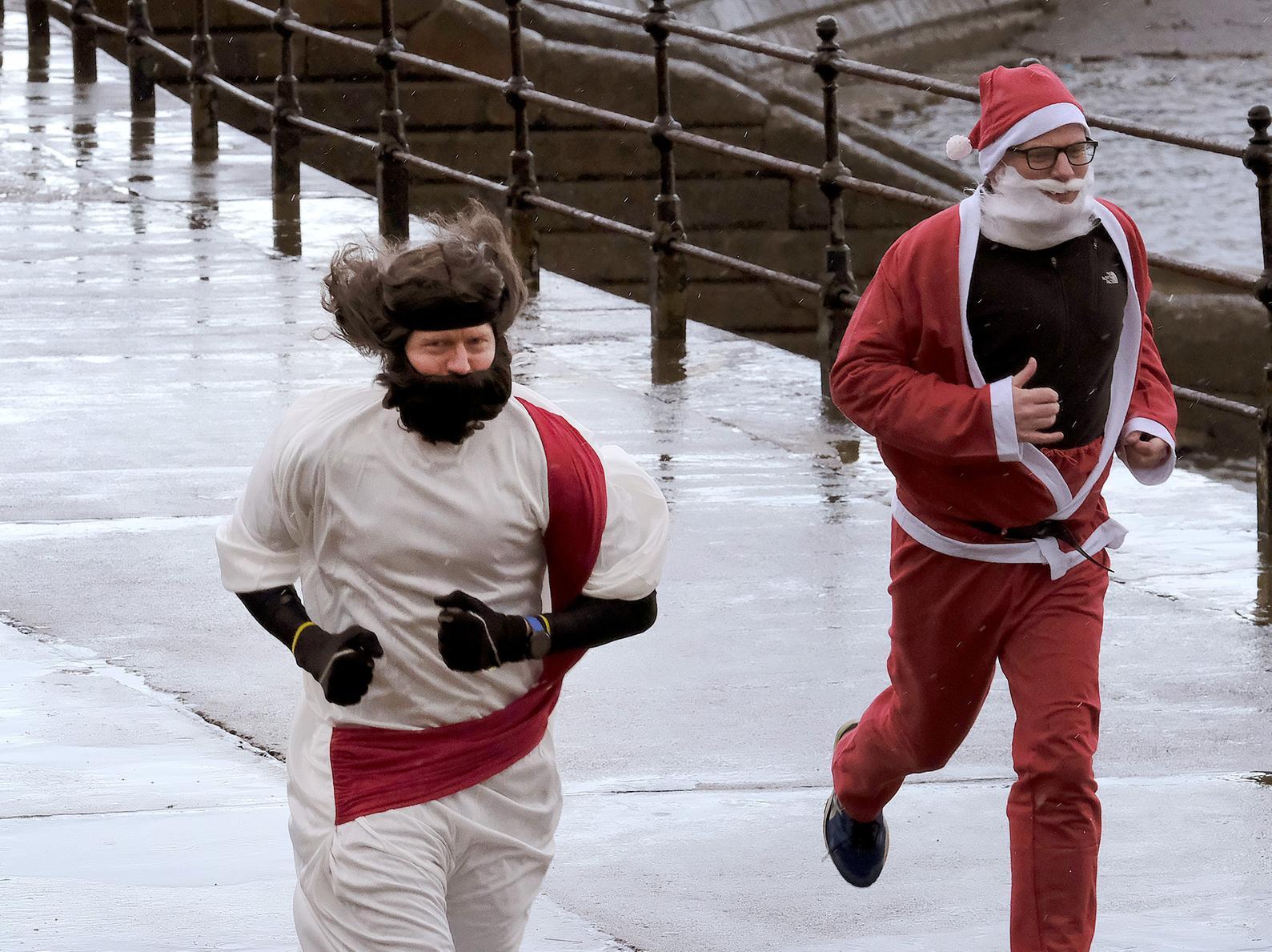 Two runners brave the elements. Picture by Richard Ponter