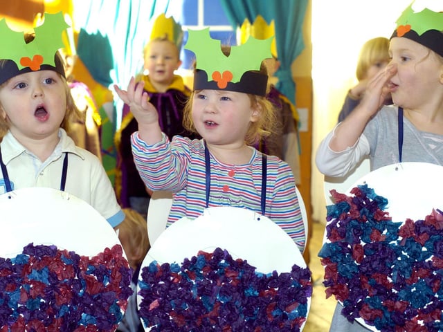 Singing Christmas puddings.