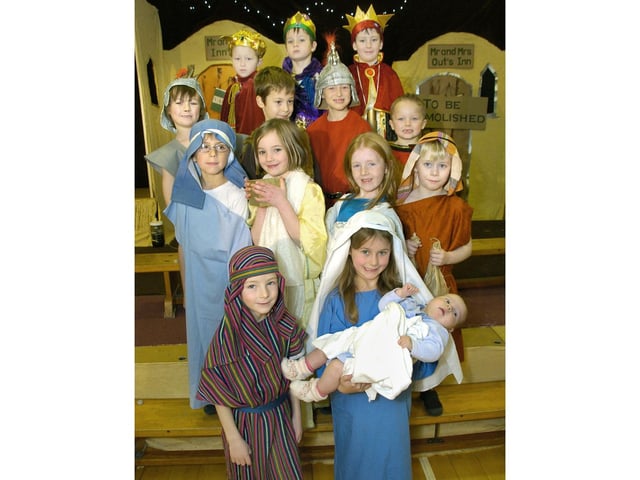 Isaac Hicks as Joseph and Zara Teasdale as Mary, with a live baby Jesus Jemima Clements.