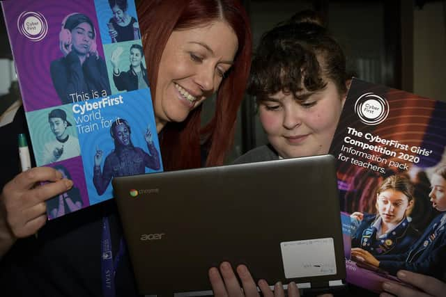 Pindar teacher Sally Nolan with a pupil. Picture by Richard Ponter