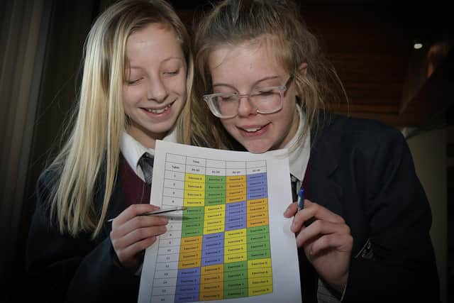 Girls from Graham work on a problem. Picture by Richard Ponter