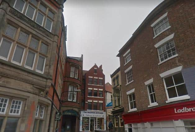 The Golden Lion Bank building seen, centre, with The Magpie's Kitchen shop on the bottom floor. Picture from Google.