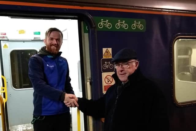 Esk Valley Railway Chairman Alan Williams greeting the Northern driver.