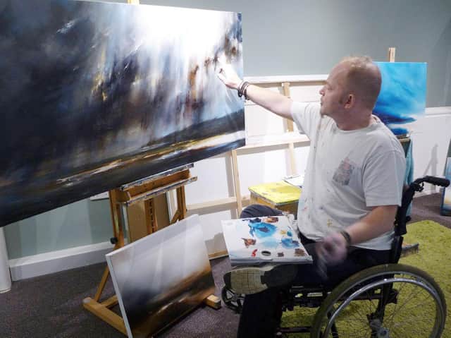 Adrian Wright at work in his studio in the Inspired By.... Gallery