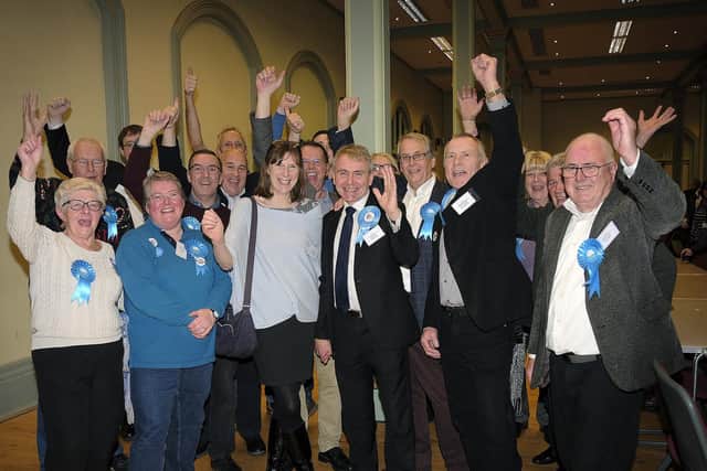 Celebrating victory at the count.