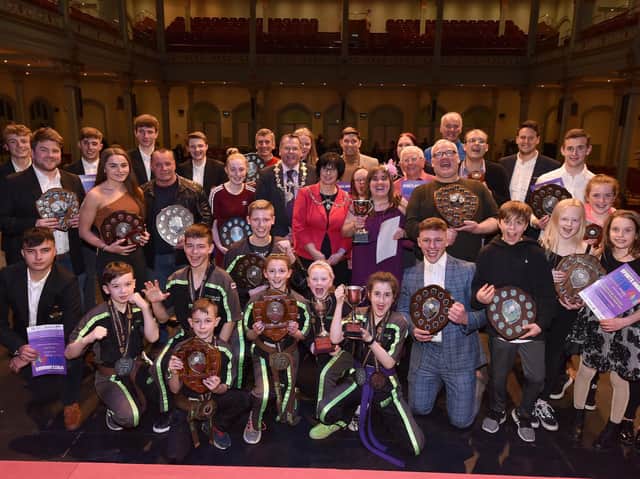 Last year's winners show off their silverware