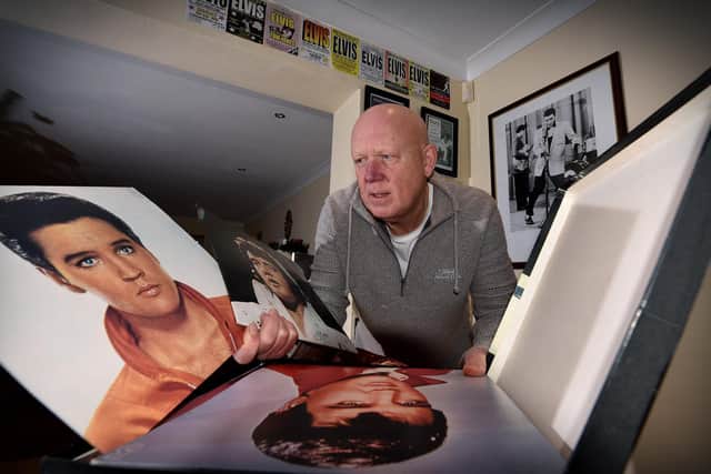 Tony looks through Elvis memorabilia. Picture by Richard Ponter