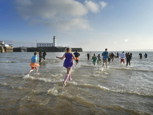 Running towards the waves.