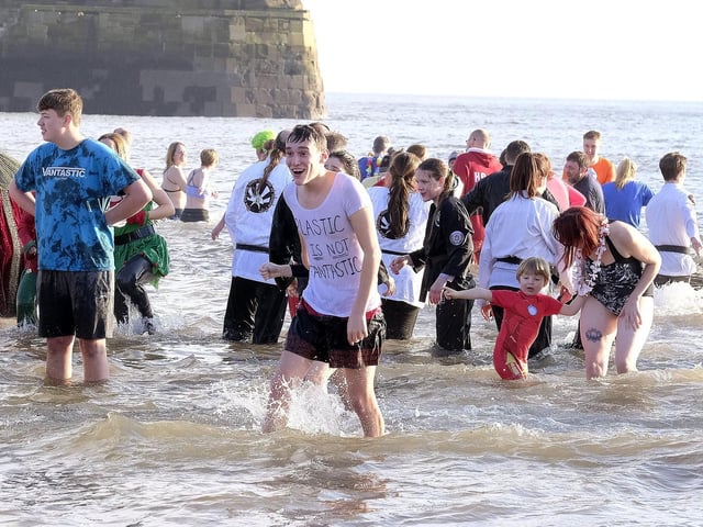 Bracing the icy waters.