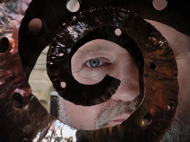 Sculptor Derek Anderson with a piece of his work at Staithes Arts Festival. Picture: Richard Ponter