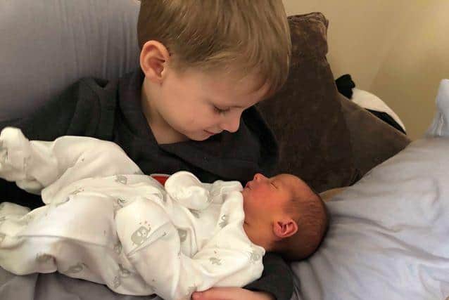 Adoring big brother Barney with his new sister. Picture: Xanthe Waterman
