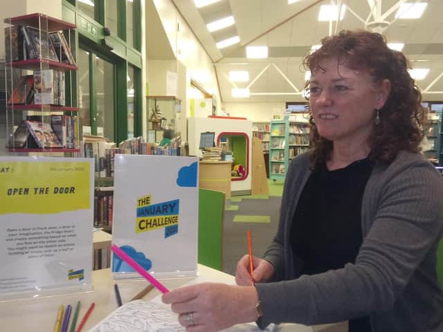 Outreach librarian Adele Duffield ready to welcome budding artists to the challenge.
