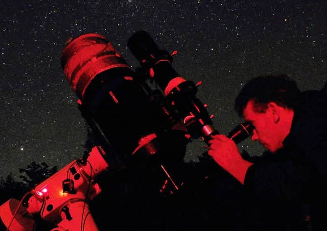 Event co-leader Richard Darn focuses on the stars.