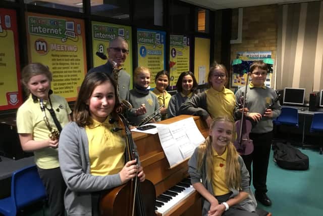 Snake with Year 6 pupils. Picture: Wheatcroft School.