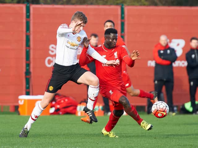 Defender Harry Spratt in action during his time at Manchester United