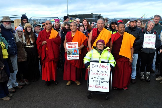 December 2017, and the Dalai Lama's Gyoto Monks pose with anti fracking demonstrators at Kirby Misperton