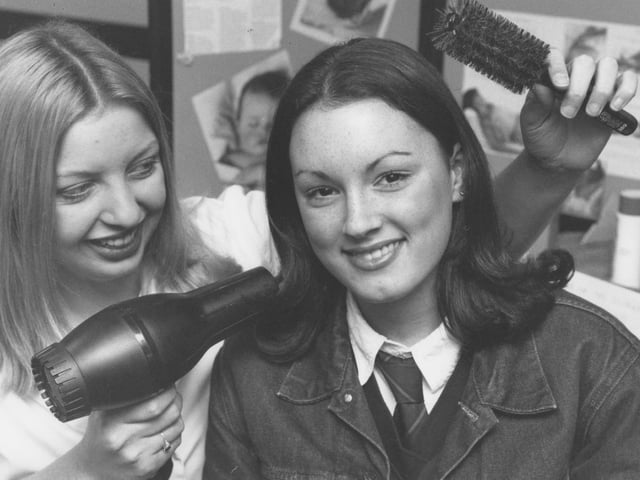 Yorkshire Coast College opened its doors to potential students for its annual open day back in November 1997. Pictured is Nicola Barker, hairdressing student, demonstrating her skills on St Augustine's School pupil Vickie Wyatt.
