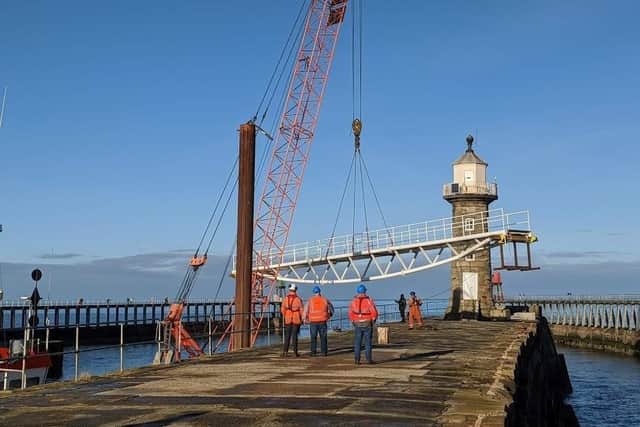 The bridge being lifted onto the East pier. Picture: Scarborough Council