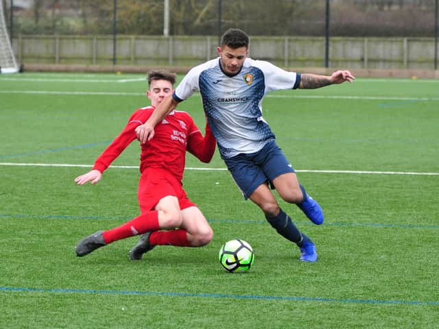 Edgehill and Newlands battle for the ball. Picture by Andy Standing.