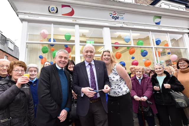 Age UK supporters, including MP Robert Goodwill and BBC presenter Harry Gration, at the grand opening.