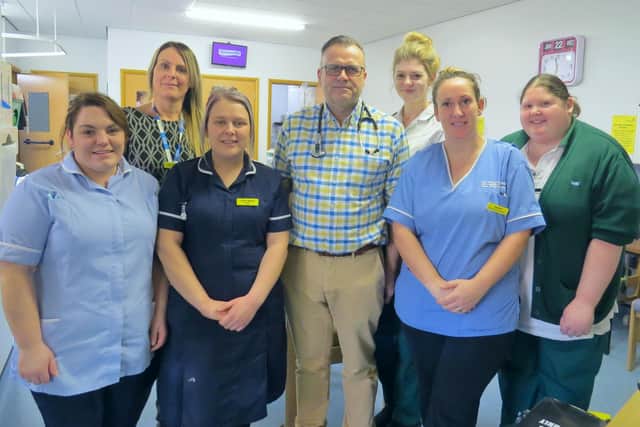 Dr Phil Jones (centre) with the Home First Unit team at Scarborough Hospital.