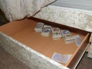 Cash seized from Davey and Brannan's house. Picture from West Yorkshire Police