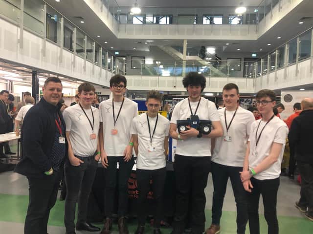 The team with their car.