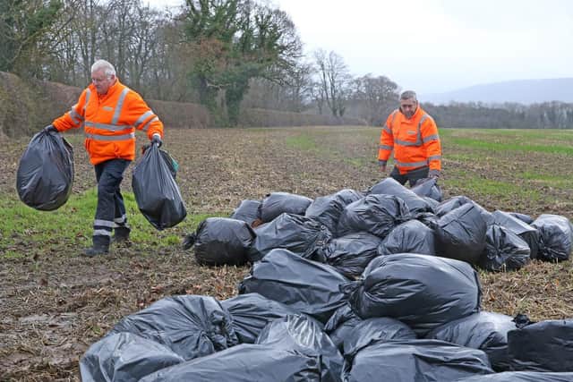 Clearing up a fly tip. Stock image.