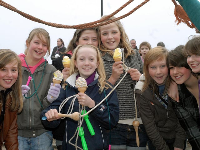 An ice cream break for these happy children.
