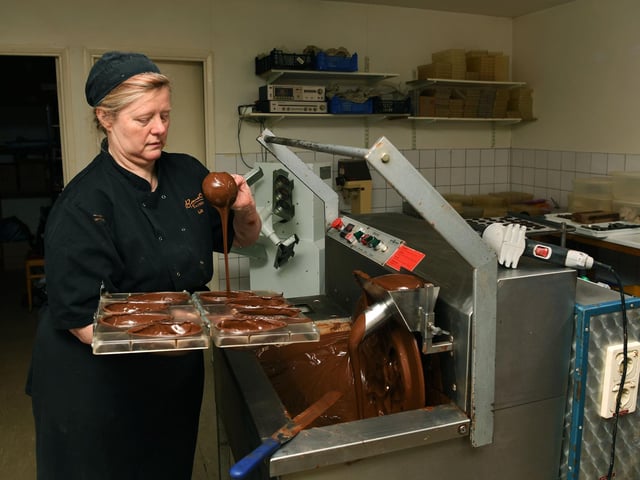 Head baker and chocolatier Liz Ward making Easter eggs.