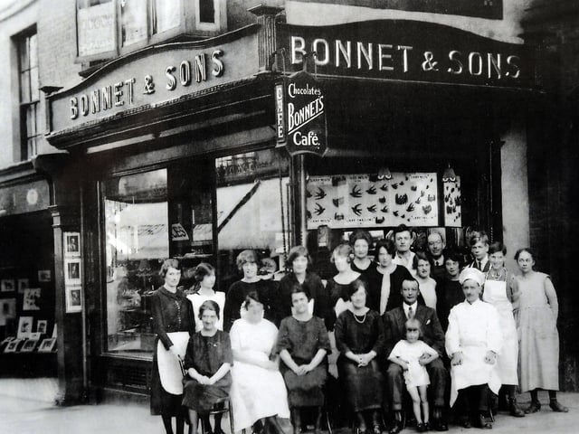 Staff outside the original cafe.