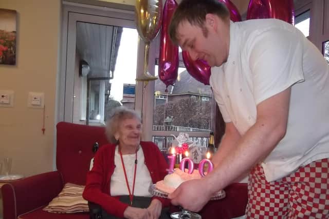 Priceholme chef Matt Newton brings Kay a 100th cake.