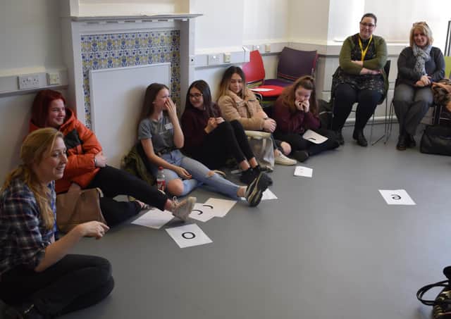 Sara Wharton demonstrates how to teach phonics to a group of North Yorkshire Care Academy students.