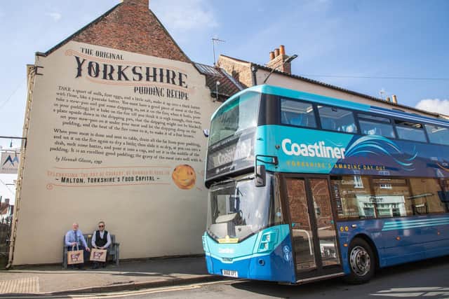 Coastliner General Manager Ben Mansfield (left) and Mark Brayshaw, Head of Visit Malton, celebrate the new partnership between the bus operator and the organisation behind Maltons success as Yorkshires Food Capital.