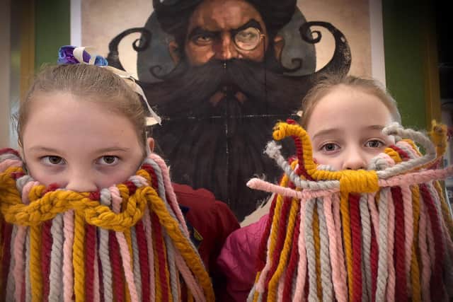 Lola and Phoebe Waddington get into the spirit of the day. Picture: Richard Ponter