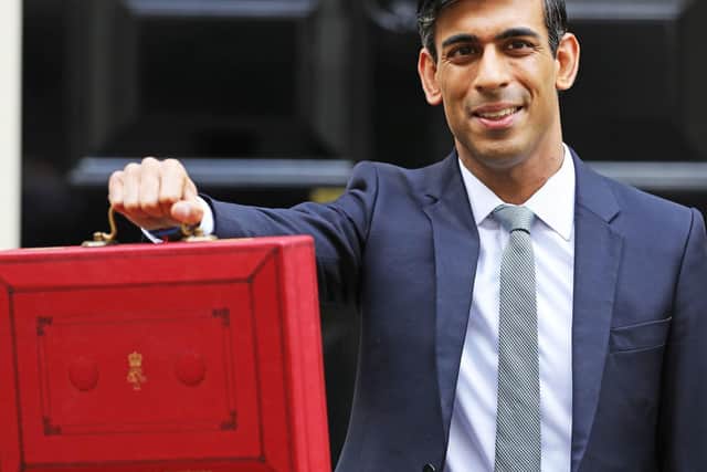 Chancellor Rishi Sunak outside 11 Downing Street, London, before heading to the House of Commons to deliver his Budget. PA Photo.