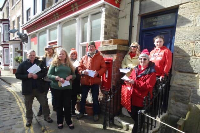 Campaigners gather outside the former Post Office in Staithes