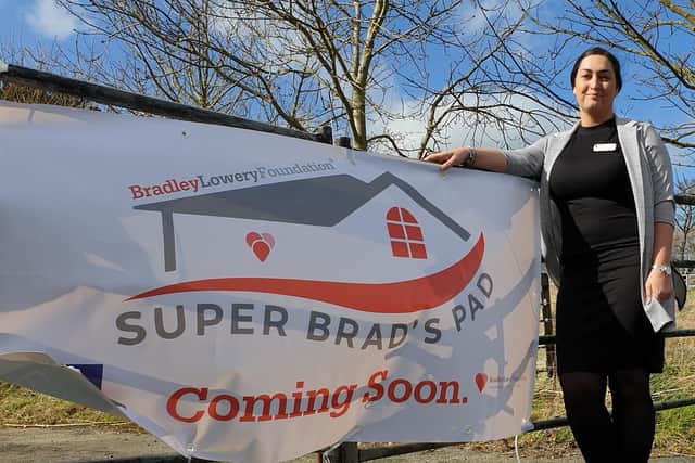 Gemma Lowery unveils the new name. Picture: JPI Media/ Richard Ponter