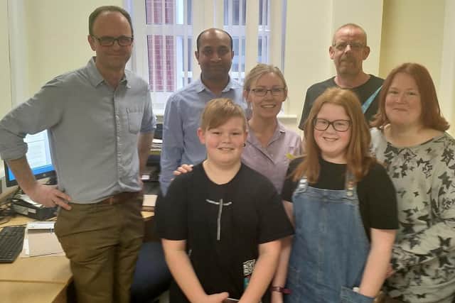 Connor and Keira Pickering, with their parents on the right, Specialist Nurse Claire Tucson (behind) and Dr Dominic Smith and Dr Chandrajay (left)