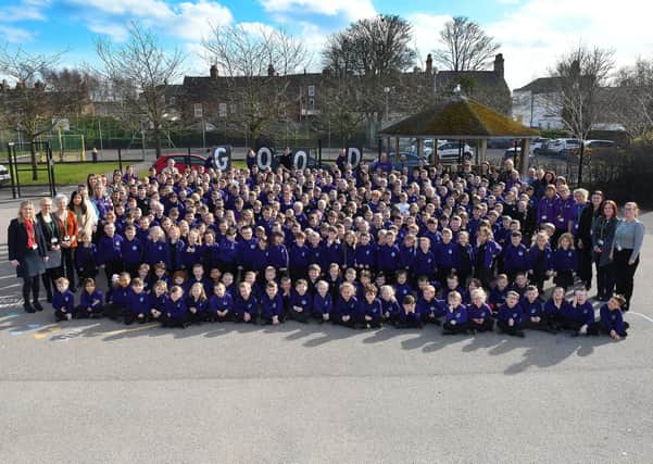 Staff and pupils at Quay Academy celebrate the ‘good’ report from Ofsted inspectors. Picture by Paul Atkinson (NBFP PA2020-12-01a)