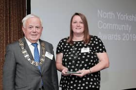 County Council chairman Cllr Jim Clark with Volunteer of the Year 2019 winner Natalie Davies